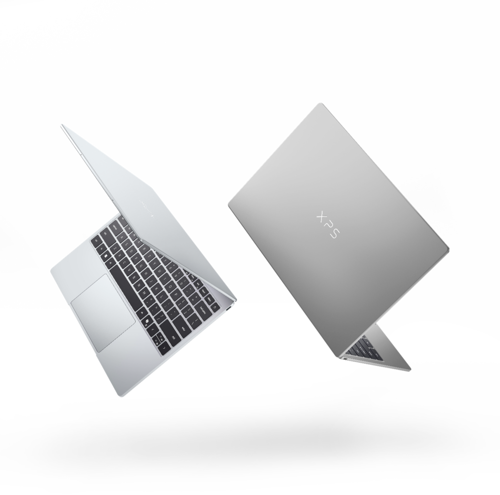 Two laptops open and floating back to back