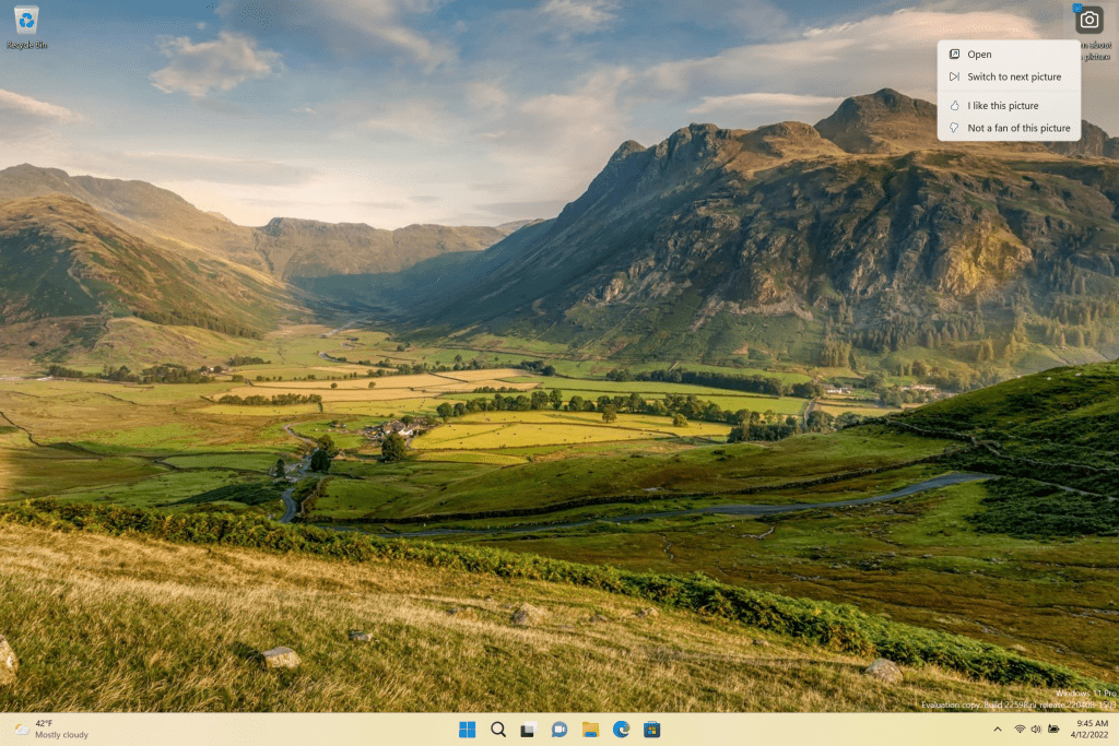 Windows Spotlight showing a beautiful background with the contest menu to like, unlike backgrounds and switch to a different background.