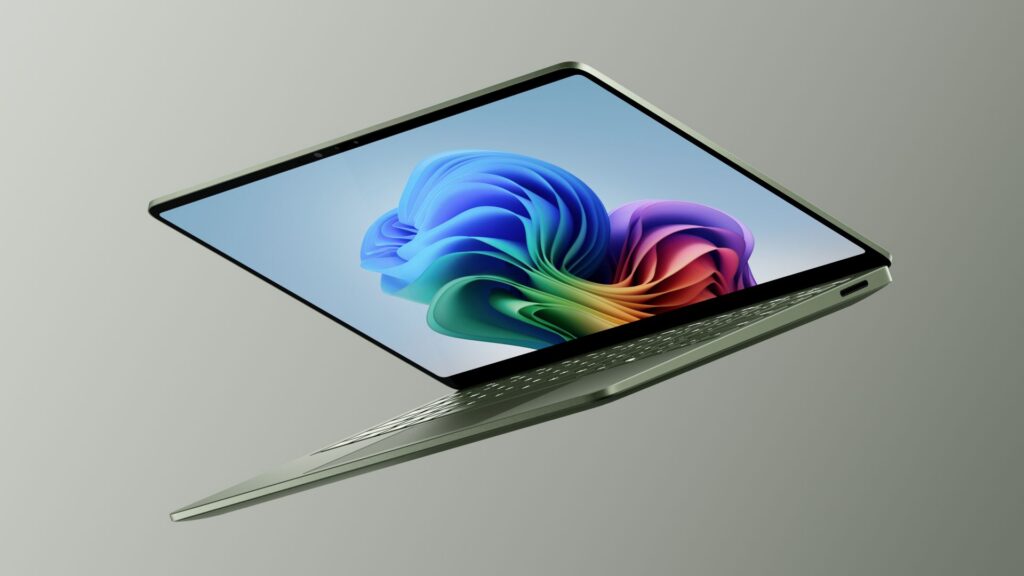Surface Laptop open and floating with screen facing left