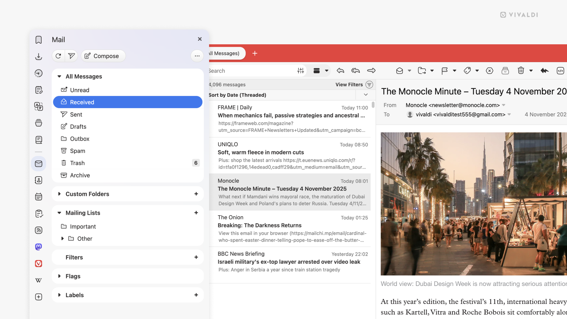The Mail Panel on desktop is highlighted and the sections are now separated in their own floating bars, which makes everything more clear and easier to find. There is an open mail from The Monocle newsletter showing a picture of a busy street with food stalls and high buildings.
