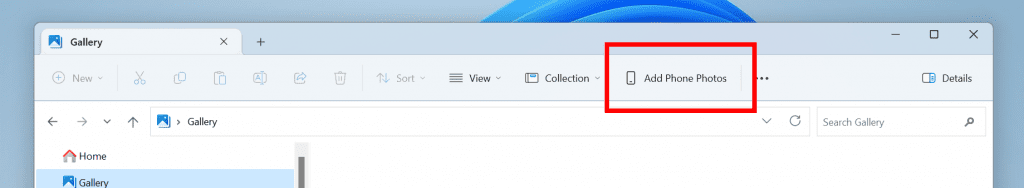 Add Phone Photos option on the command bar in File Explorer.